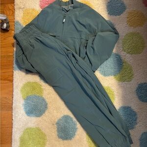 Athleta Teal Track Suit size 8/10